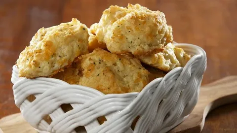 Crab Stuffed Cheddar Bay Biscuits with Lemon Butter Sauce